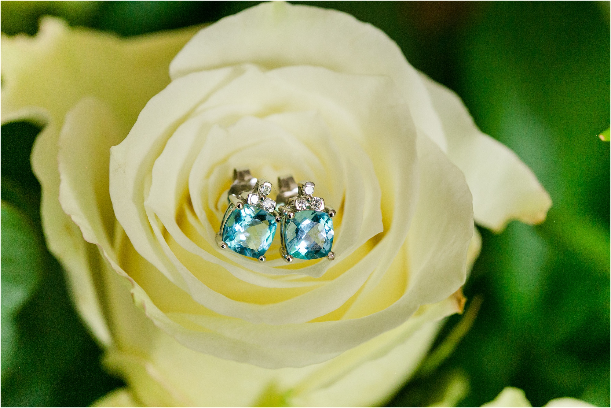 aquamarine earrings on ivory rose macon wedding