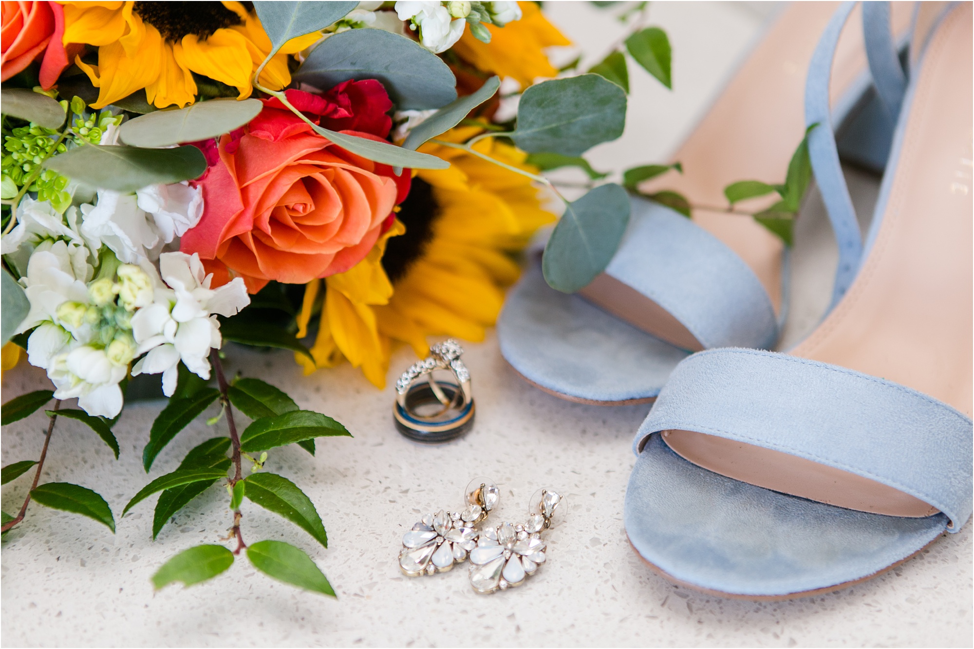 macon ga wedding bright bouquet with sunflowers and orange roses blue shoes and rings