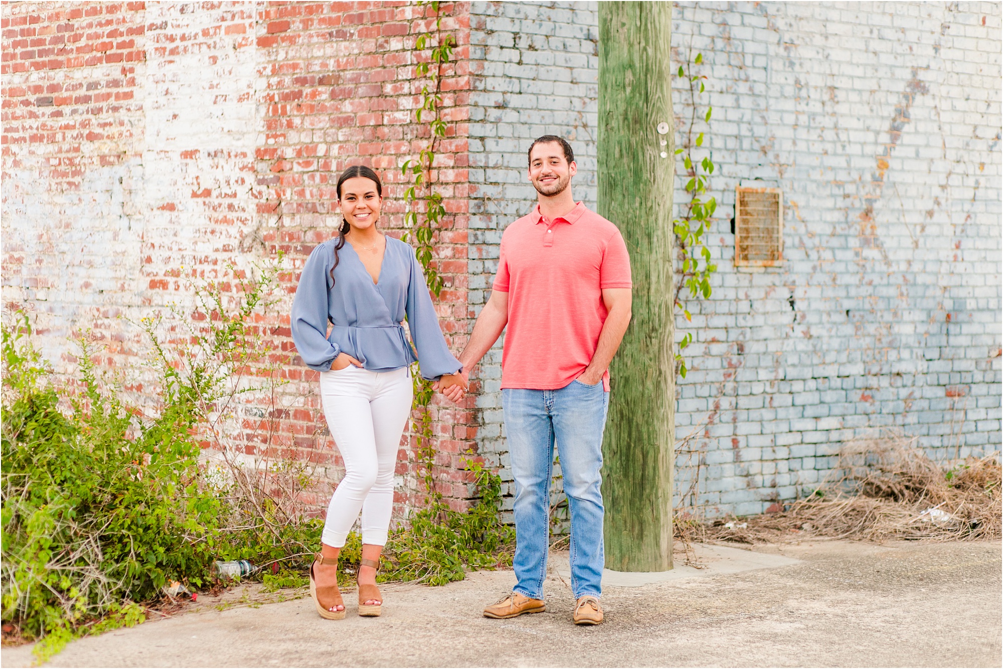 engagement pictures downtown macon brick wall