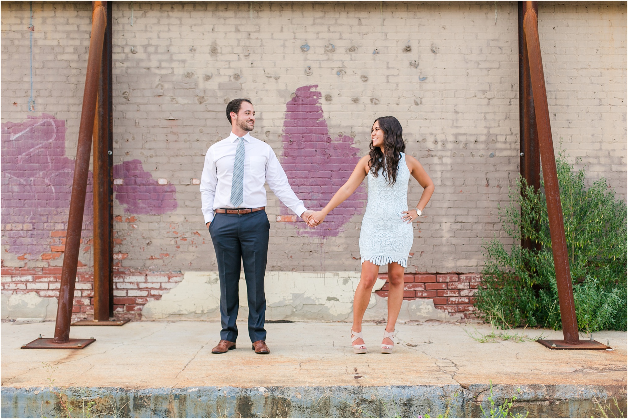 downtown macon georgia engagement llight blue dress and blue suit warehouse loading dock